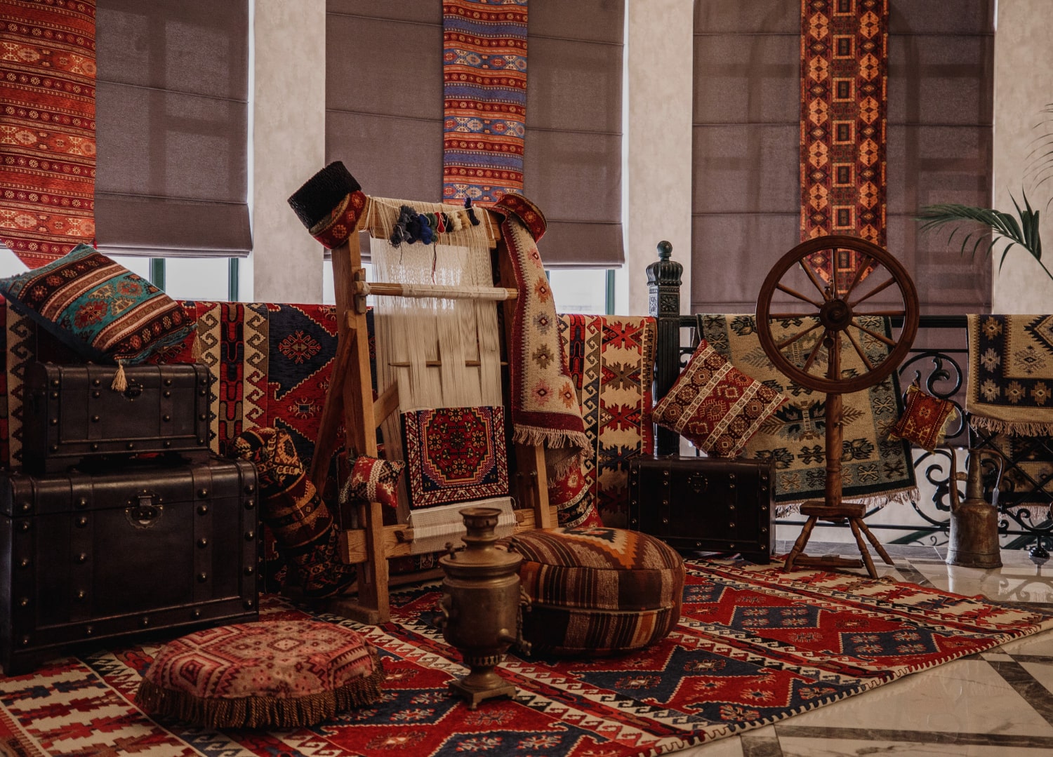 Traditional weaving setup with carpets, ideal birthday gift idea in Saudi Arabia.