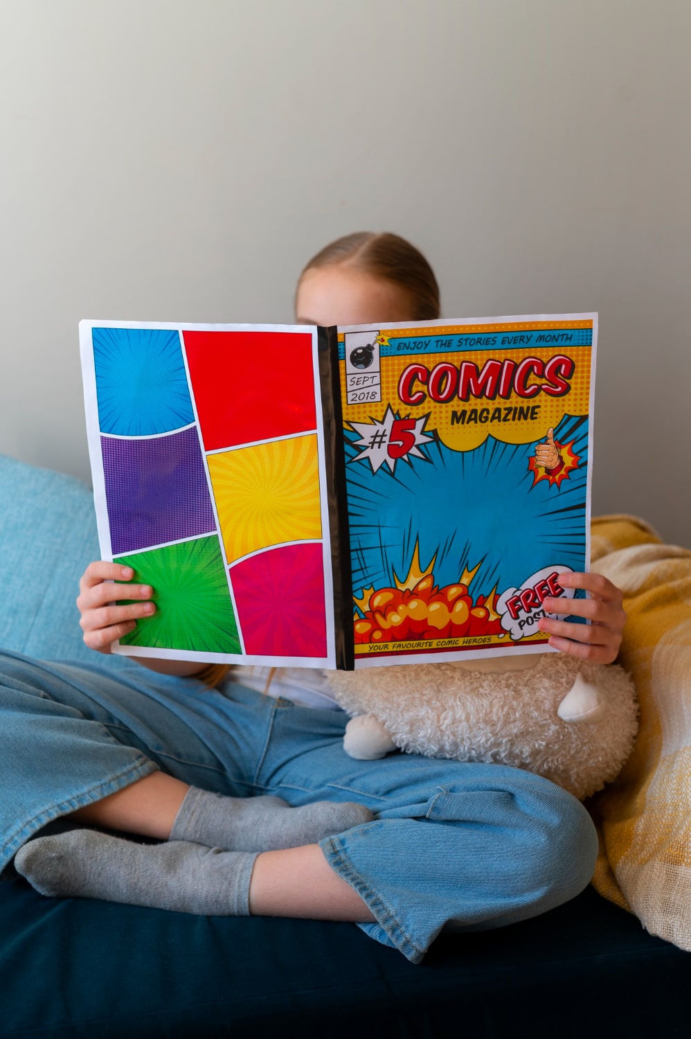 Child reading comics, great Women's Day gift